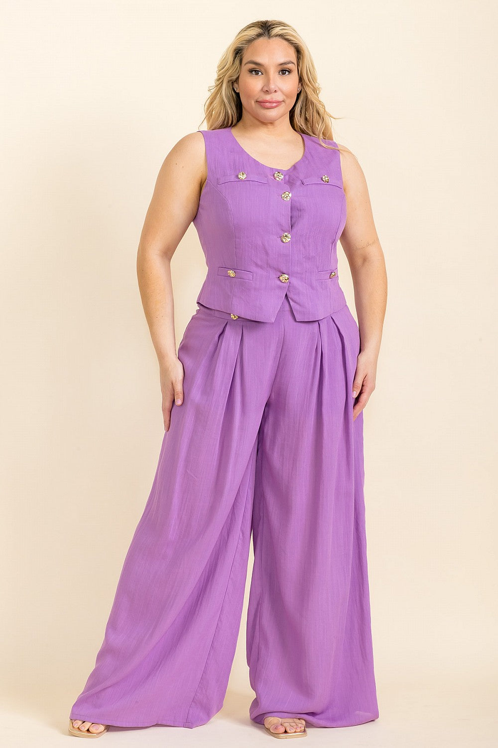 Purple Set of top with golden details and wide leg pants seen from the front